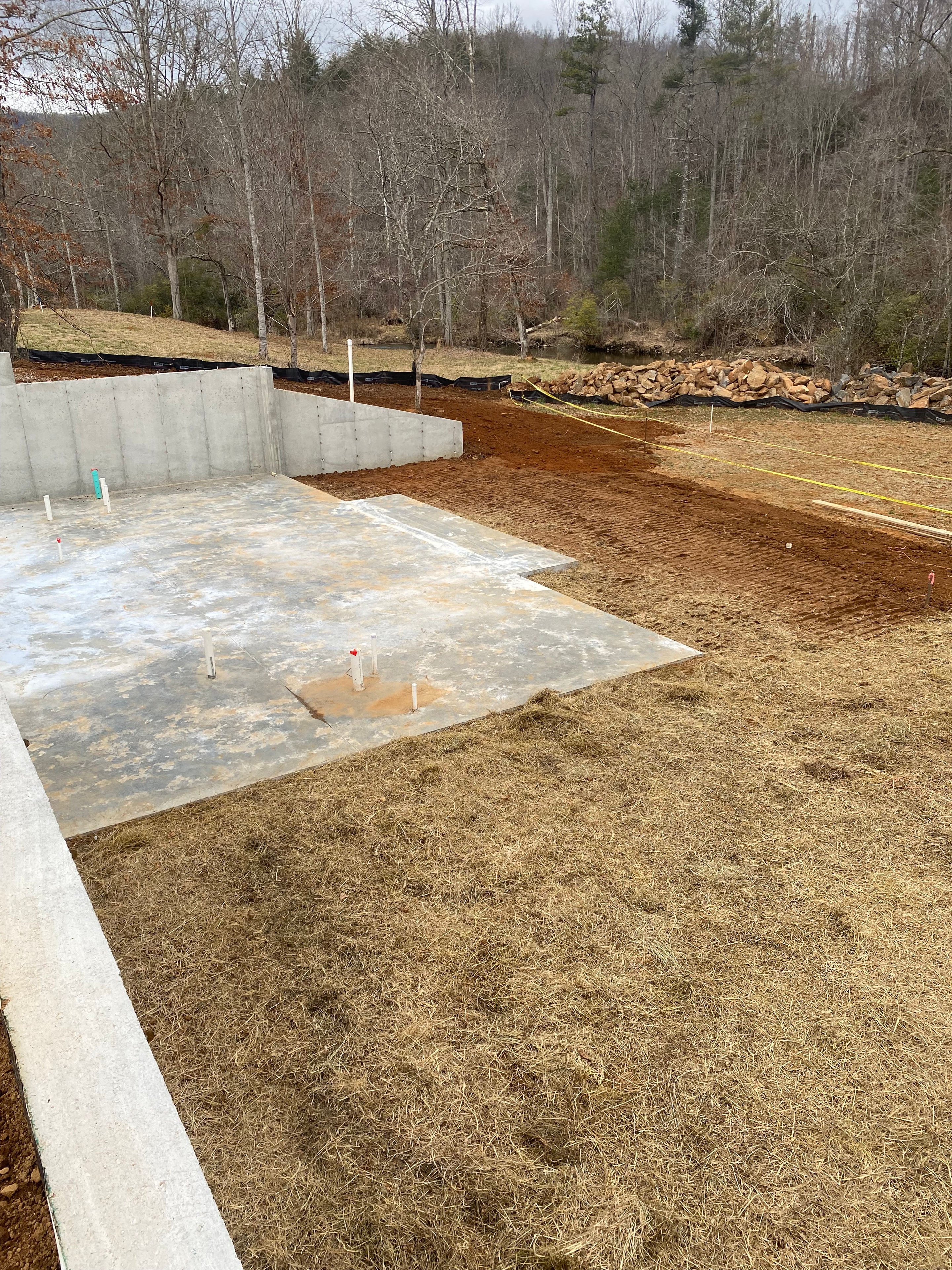 Concrete foundation construction site in forest